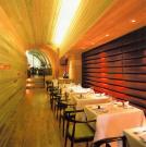 Hip NYC supper-club with dramatic design and menu